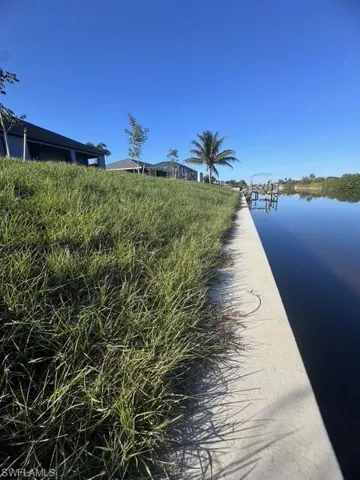 Water view with a dock