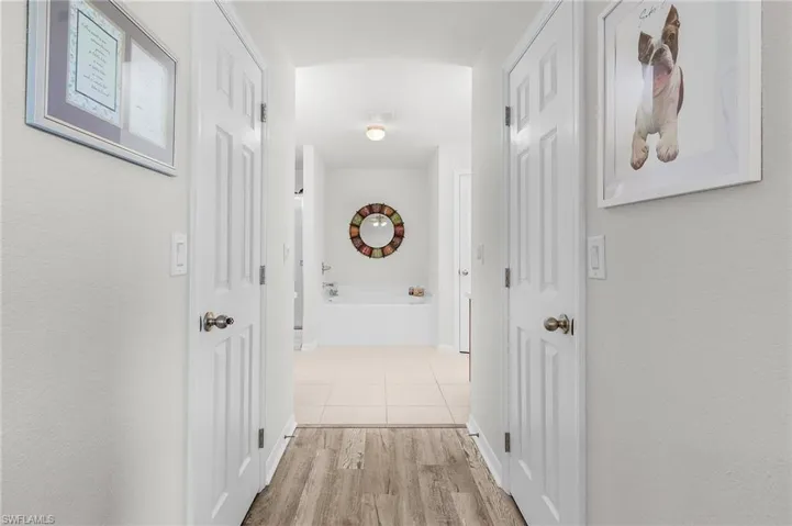 Hallway, his and her closet