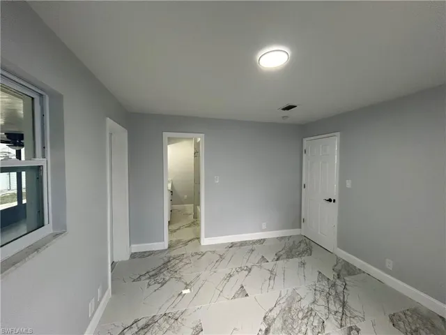 View of tiled empty room