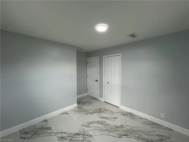 View of tiled empty room