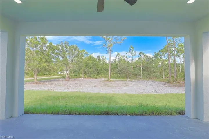View of patio with a ceiling fan