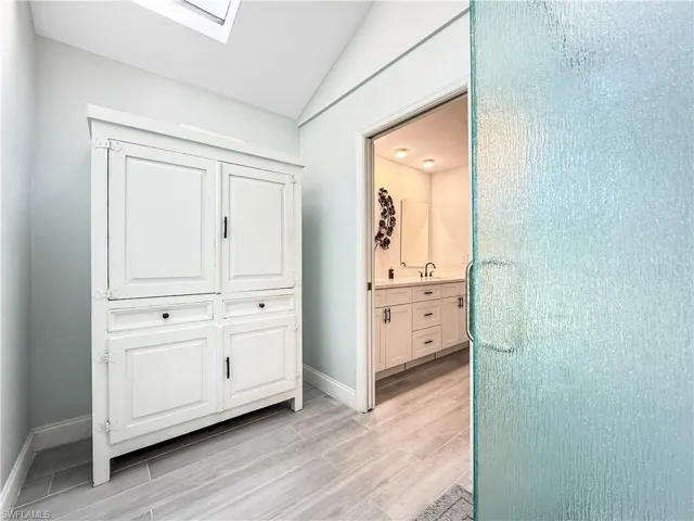 Armoire wood finish floors, and a skylight