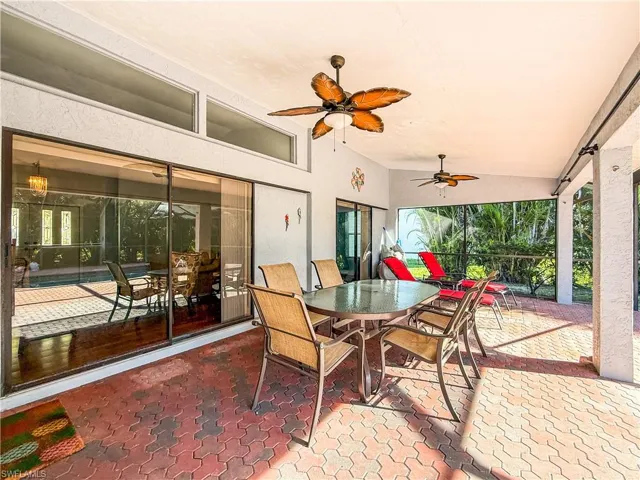 View of patio / terrace featuring outdoor dining space and ceiling fan