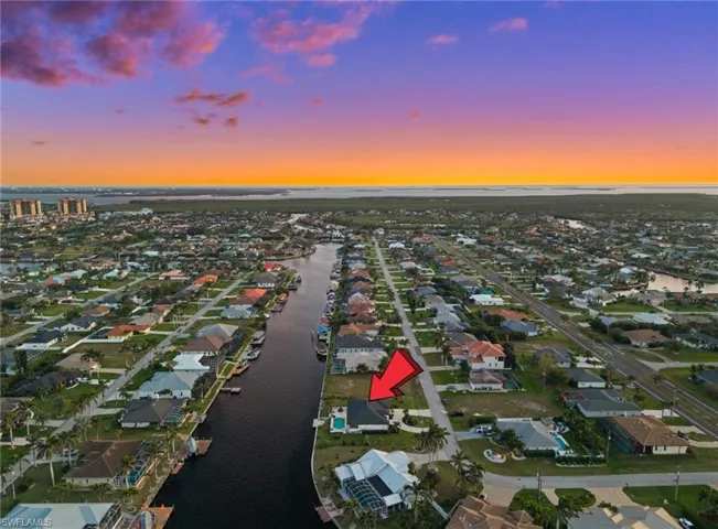 Overlooking the House, Canal, and Cape Harbour in the Evening