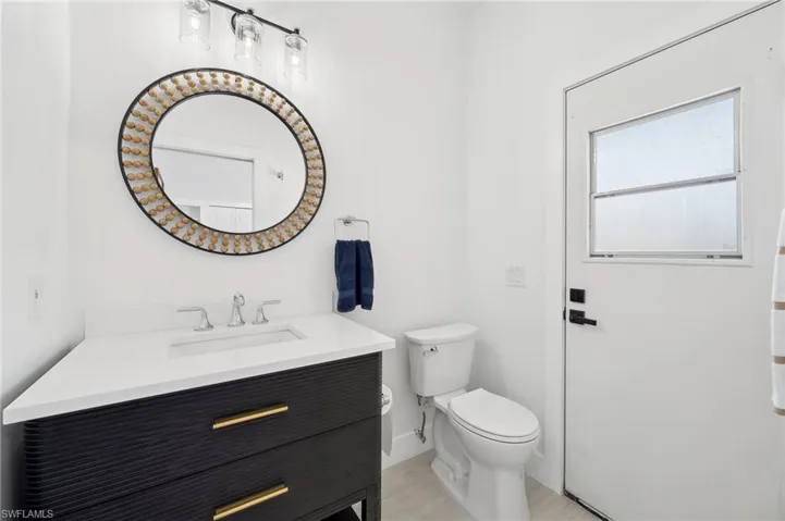 Remodeled Ensuite Lavatory opens to the Pool