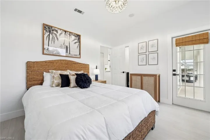 Bedroom 2 has ensuite lavatory, and Opens to the Lanai and Pool