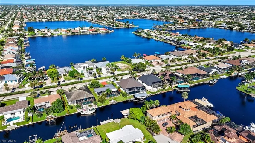 Aerial view of residential area with a large body of water