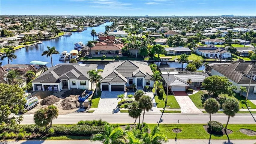 Aerial view of residential area with a large body of water