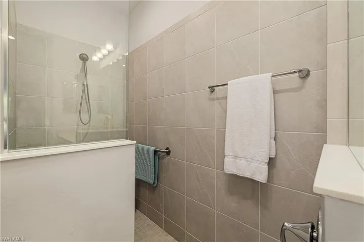 Bathroom with a tile shower
