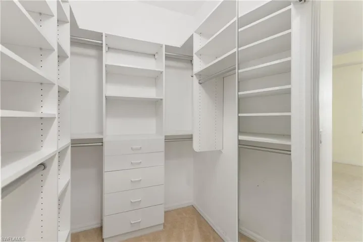 Primary Bedroom with 2 Spacious Walk-In Closets & Built-In California Style Organizer Closets