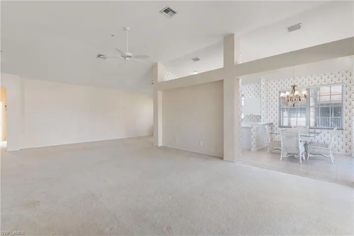 Kitchen Eating Area from Living Room with High Vaulted Ceilings