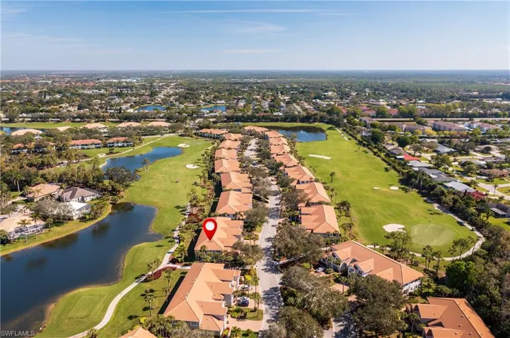 Bird's Eye View Featuring a Water View & Golf Course