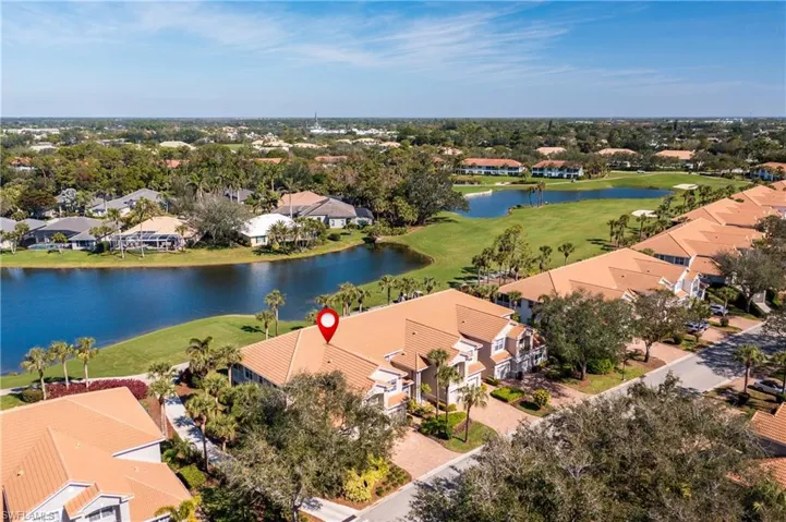 Location! Location! Aerial View Featuring a Water/Golf Course View