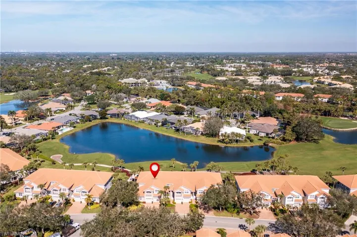 Aerial View Featuring Water & Golf Course Views