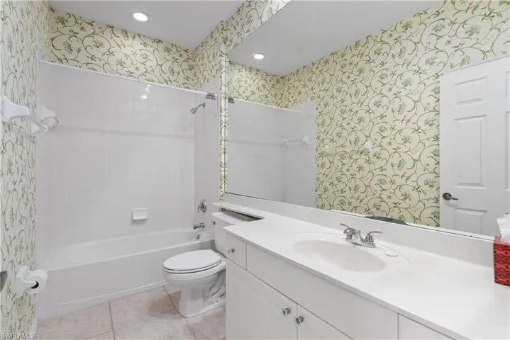 Full Bathroom with Vanity, & Combination Shower/Tub Combination