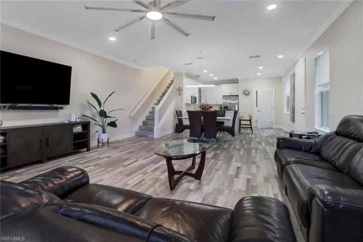 Open concept living area with light wood-style flooring