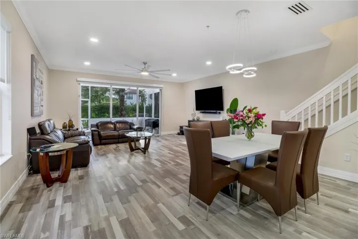 Open concept Great Room with sliding glass doors leading to the lanai