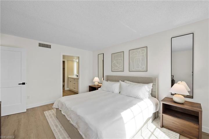 Primary bedroom opens to ensuite bath and walk in closet