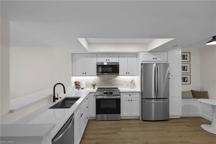 Bright and open kitchen, all new, including flooring