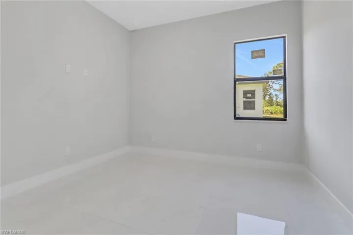 Spare room with baseboards