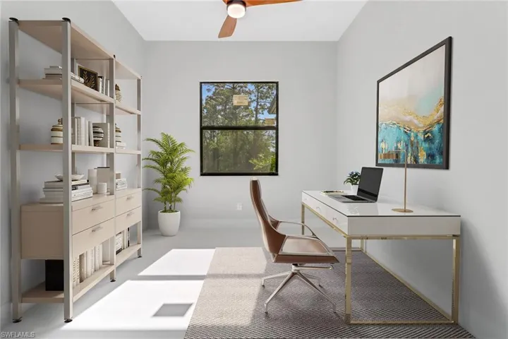 Office area with a ceiling fan