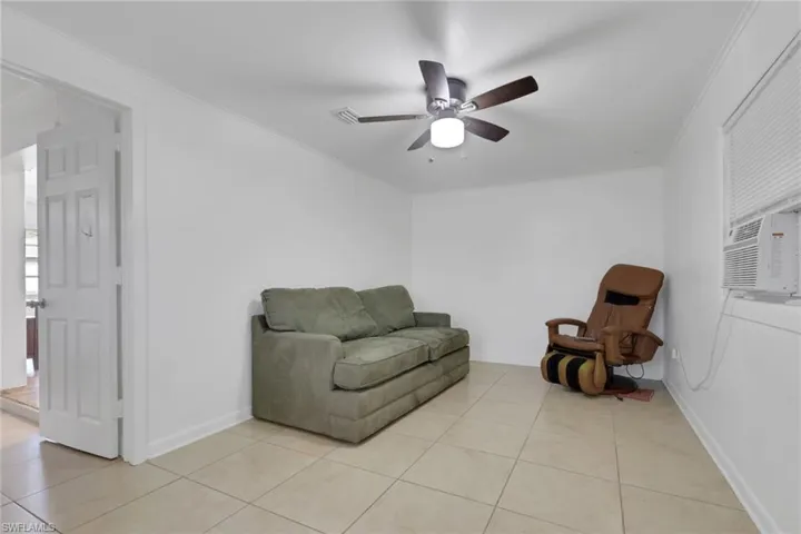 Neutral-toned tile flooring throughout