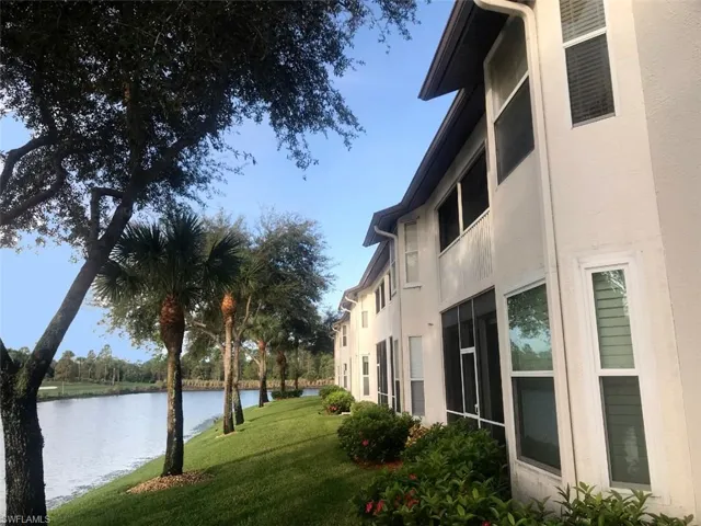 Back of property overlooks gorgeous lake.