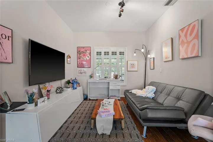 Living area with wood finished floors