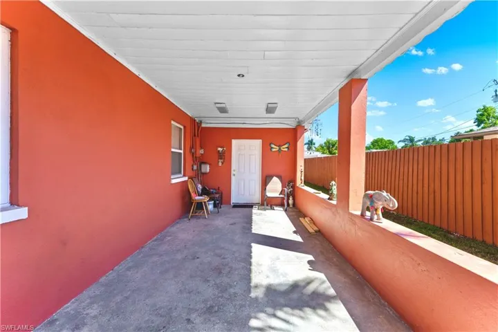 View of patio with fence