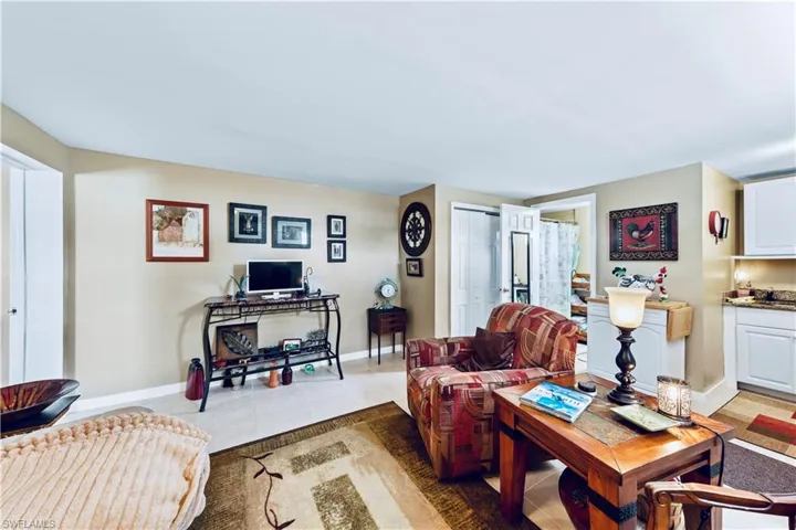 Tiled living area with baseboards