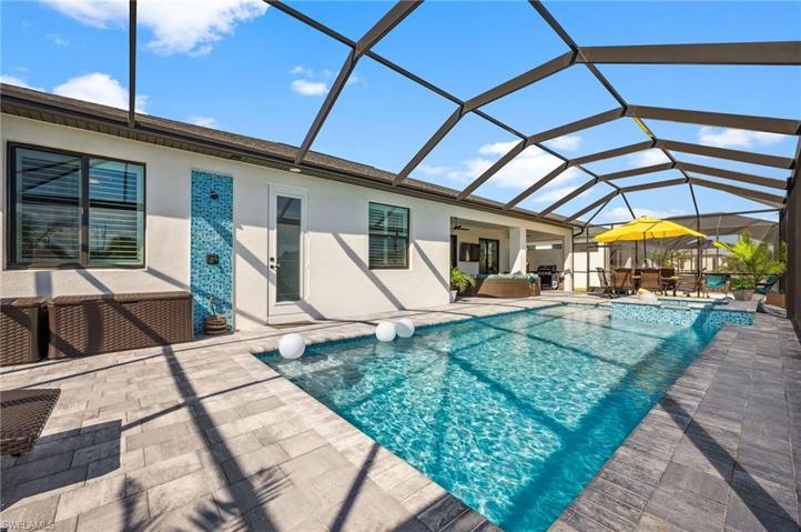 Large pool area with pool bath and outdoor shower