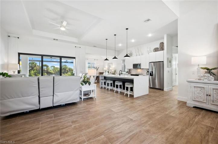 Entryway view of the kitchen and family room