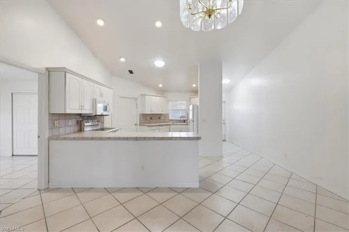 Vaulted ceilings over the kitchen and living areas
