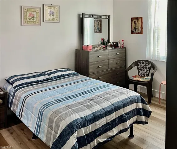 Bedroom featuring light wood-type flooring