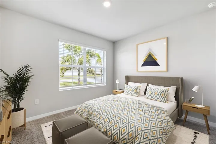 Virtually Staged* View of carpeted bedroom
