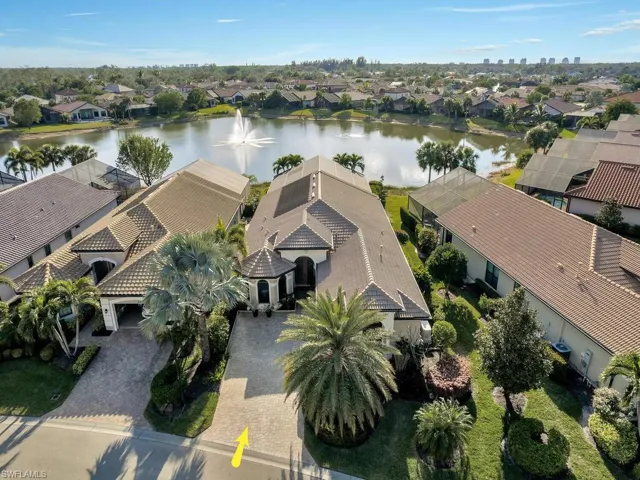 Aerial view of residential area with a nearby body of water