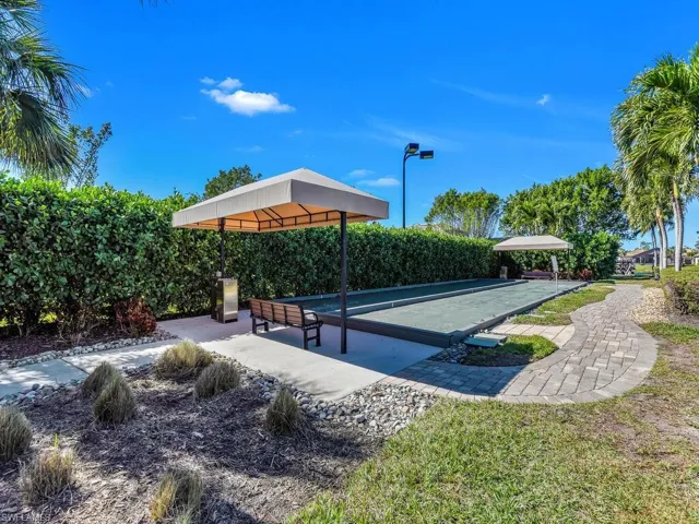 View of home's community featuring a bocce ball area
