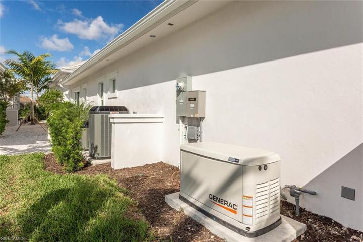 22K W GENERAC W/200AMP AUTO TRANSFER SWITCH & LOAD SHEDDING TECHNOLOGY TO HVAC UNITS.