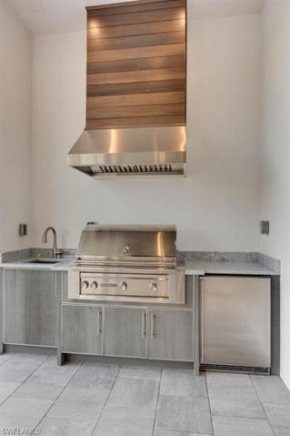 OUTDOOR KITCHEN-LYNX 36" SS GAS GRILL, ZEPHER SS HOOD W/CYPRESS TONGUE & GROOVE CHIMNEY,U-LINE FRIDGE,ELKY QUARTZ SINK W/GROHE FAUCET