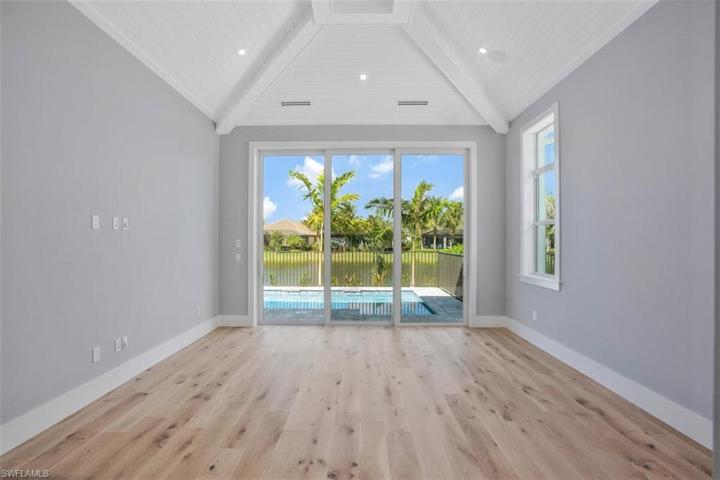 EXPANSIVE HEIGHT VAULTED CEILING W/BEAMS, SHIPLAP & SONOS SPEAKERS