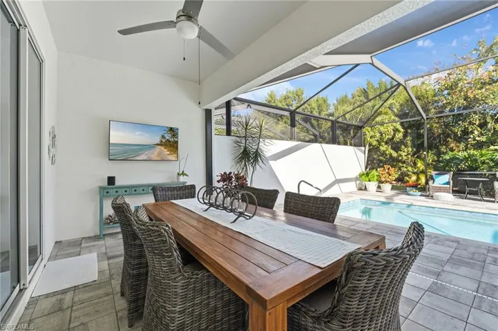 The lanai offers ample covered space, perfect for entertaining or relaxing while staying protected from the elements.