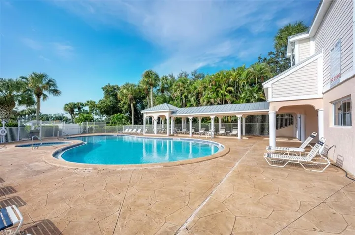 View of swimming pool featuring a gazebo and a patio area