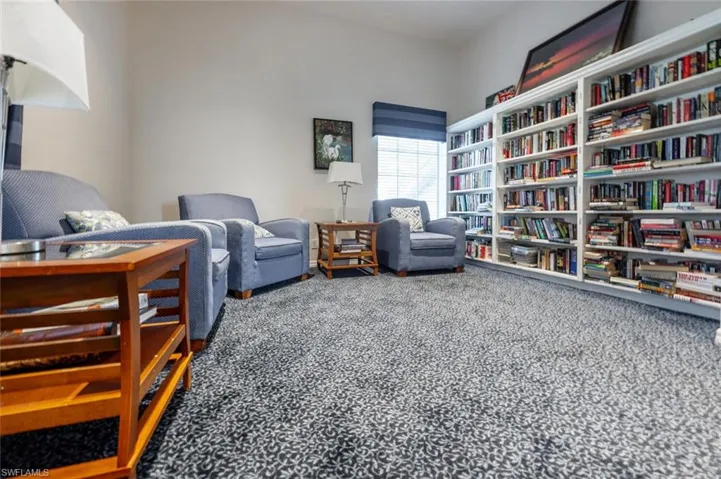 Living area featuring carpet floors