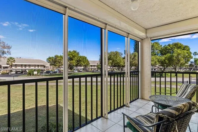 Screened-In Lanai With Roll-Down Panels