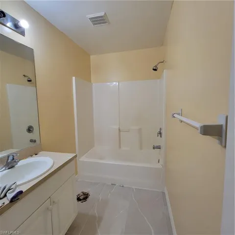 Full bath with vanity and  shower combination