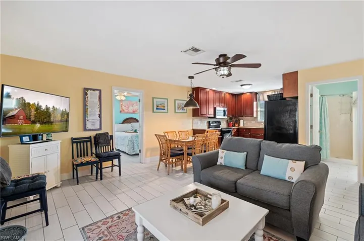 Living room featuring ceiling fan