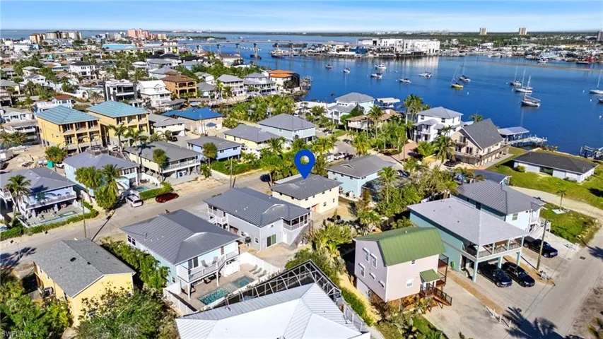 Aerial view featuring a water view