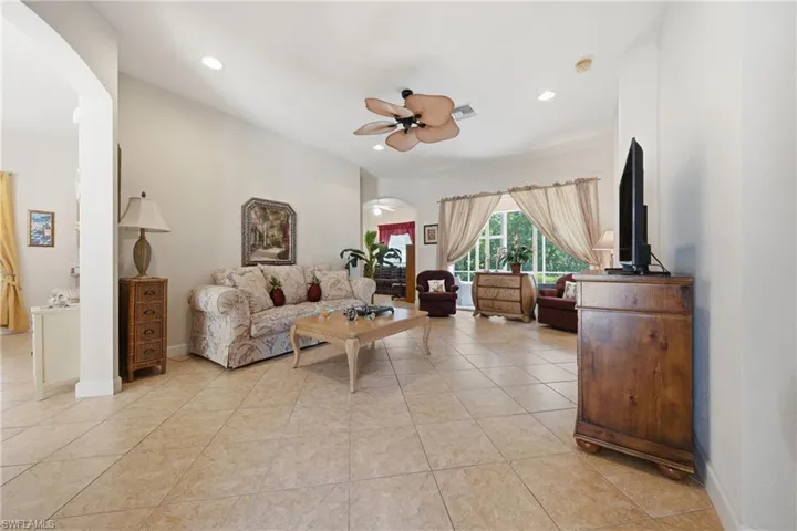 Comfortable primary living room with plenty of natural light