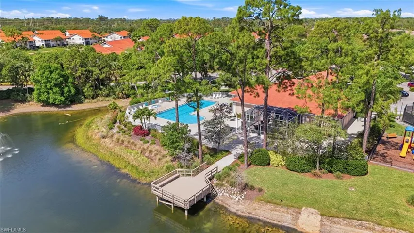 Aerial community view showcasing the lakes, greenery, and amenity-rich setting