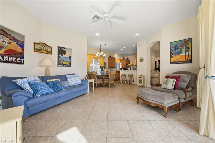 Open family room and dining area designed for comfortable everyday living and entertaining